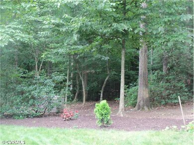 Exterior Back - Treed back yard