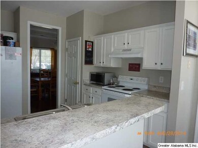 Kitchen with New Counter Tops on Cabinets and Brea