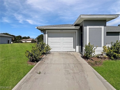 1306 W 12th St, Lehigh Acres, FL 33972 - photo 2