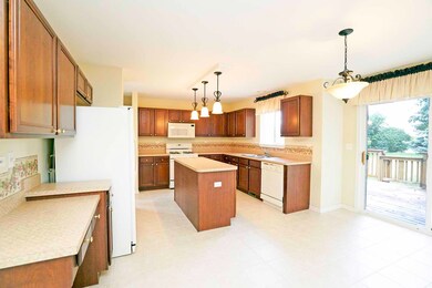 Beautiful open concept kitchen- Cherry Wood Cabine