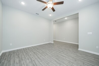 Spare room with light wood-style flooring, ceiling fan, and recessed lighting