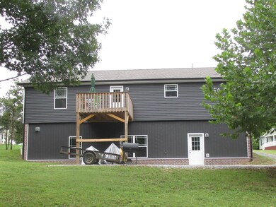 Basement has high ceilings and windows.