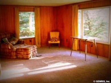 Living Room. Large windows take in the view