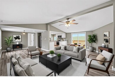 Living room featuring vaulted ceiling with beams,