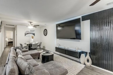 Living room featuring wood-type flooring