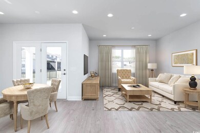 Living room with light hardwood / wood-style floor