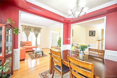 Dining room featuring a notable chandelier, orname