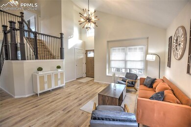 Living room featuring light hardwood / wood-style 