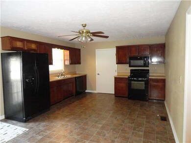 Beautiful country kitchen with almost new appliances and flooring.  All kitchen appliances remain.