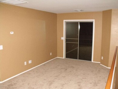 Loft with doors to patio
