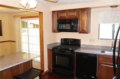 Kitchen boasts brand new cabinets and granite coun