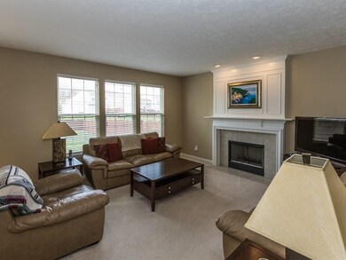 FamilyRm with gas-starter fireplace and lots of windows overlooking the spacious backyard!
