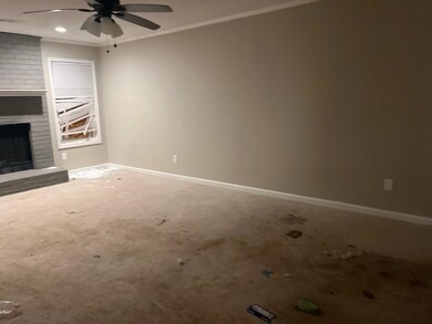 Unfurnished living room featuring carpet flooring,