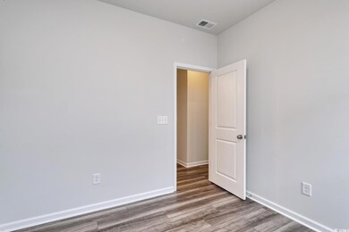 Unfurnished room with wood-type flooring