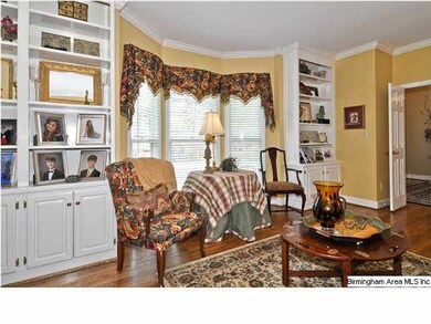 Parlor/living room with built in bookshelves