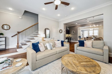 Hardwood floors throughout the entire home along with stunning crown molding on every floor.