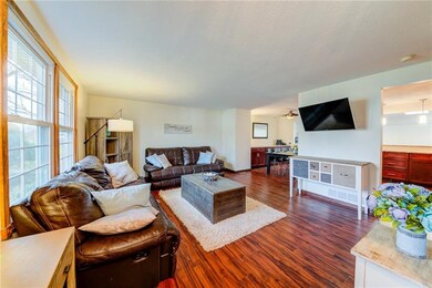 living room has open floor plan all new flooring a