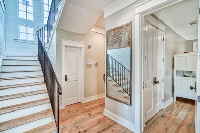 Stairwell to Kitchen and Living Space