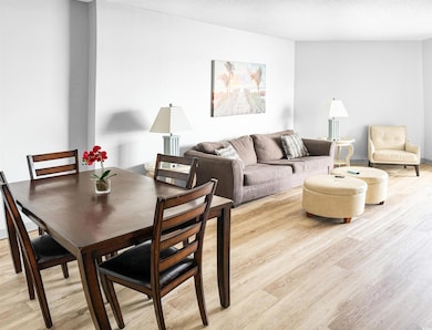 Dining space featuring light wood finished floors