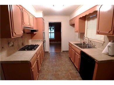 Updated Kitchen with Tile Floor, Tile Counter Tops