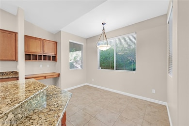 Unfurnished dining area with healthy amount of natural light and light tile patterned floors