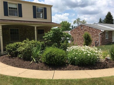 Gorgeous landscaping and pristine yard.