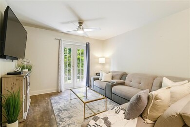Two separate balcony accesses offer an abundance of natural light in this open floor plan residence