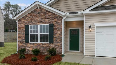 *Photos are Representative - Home will have side load garage w/ shared driveway*