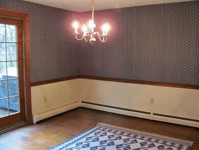 Dining Room. Sliders, wood floor
