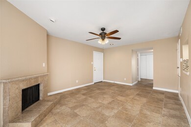 This photo showcases a spacious, neutral-toned liv