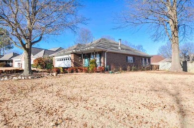 This home is nestled on a large lot highlighted by