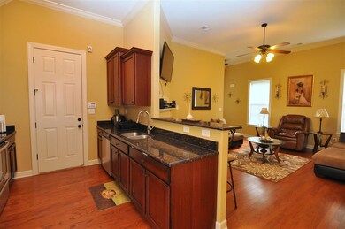 The kitchen opens to the great room for easy enter