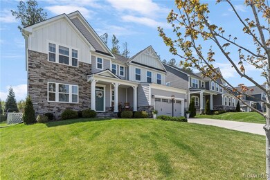 Admire the stacked stone and board and batten exte