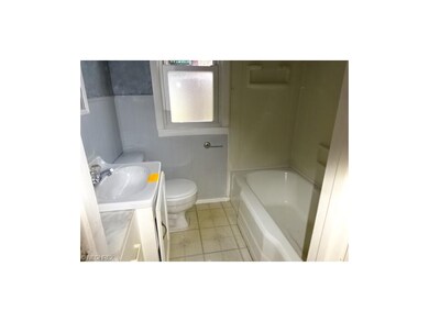 First floor full bathroom with tub & shower