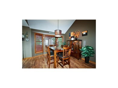 Neutral colors and warm burlwood floors