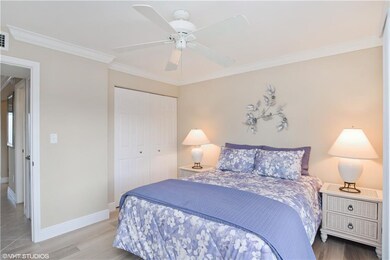Another view of the bedroom looking out to the hal