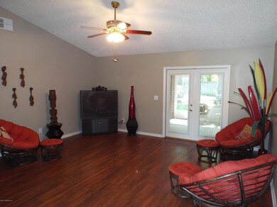 Family Room Featuring Wood Floors