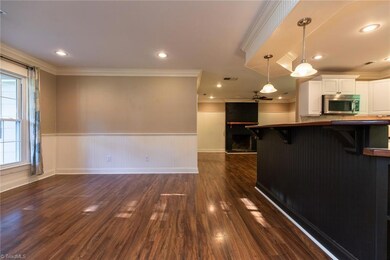 Dining room with open concept to kitchen area