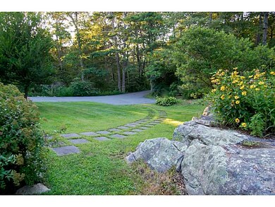 Exterior Front. Front yard looking towards guest p