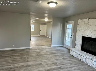 Unfurnished living room featuring a healthy amount