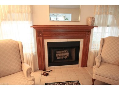 A beautiful wood and ceramic fireplace