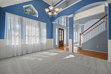 Look at the architectural details in these formal spaces from the dramatic ceilings, arches, columns, crown molding and paint details!