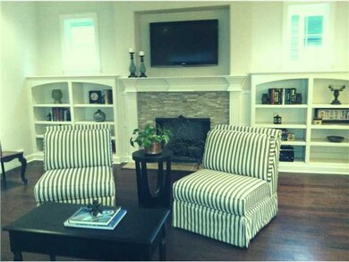 Lots of Natural Light, Natural Stone Fireplace Sur