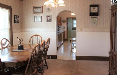 A view of the dining room from the front entry to 