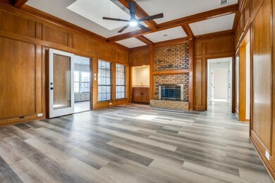 Unfurnished living room with light wood-type floor