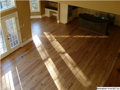 View of Family Room/Kitchen from catwalk