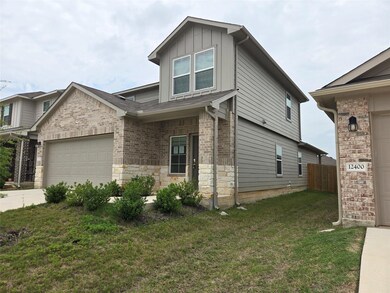 View of front of property with board and batten s