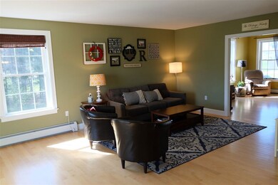 Open floor plan Living room. Slider to deck.
