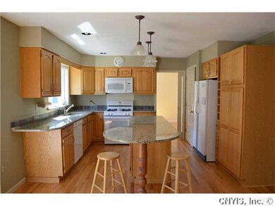 Exterior Front. Granite counters - The post under 