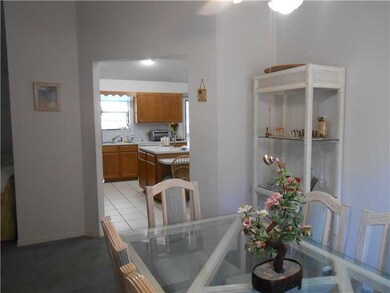 Dining Room. Looking toward the ceramic tiled kitc
